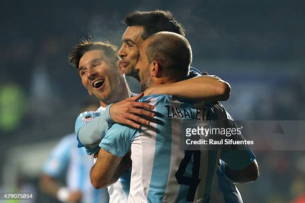 Javier Pastore of Argentina celebrates with teammates Lionel Messi and Pablo Zabaleta after scoring the second goal of his team during the 2015 Copa...