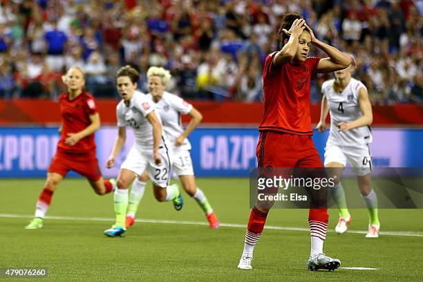 Celia Sasic of Germany reacts after missing a penalty kick against the United States in the second half in the FIFA Women's World Cup 2015 Semi-Final...