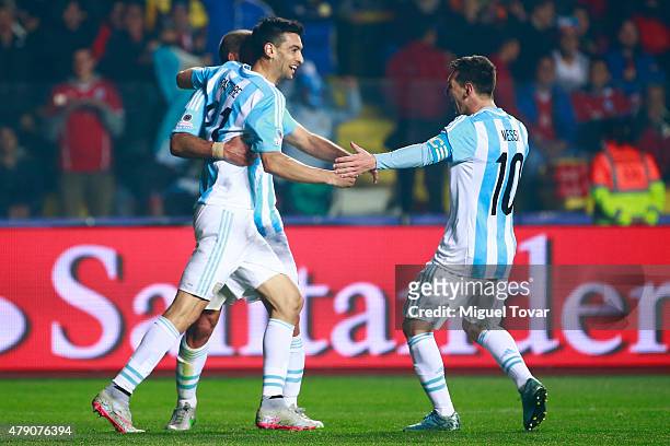 Javier Pastore of Argentina celebrates with teammate Lionel Messi after scoring the second goal of his team during the 2015 Copa America Chile Semi...