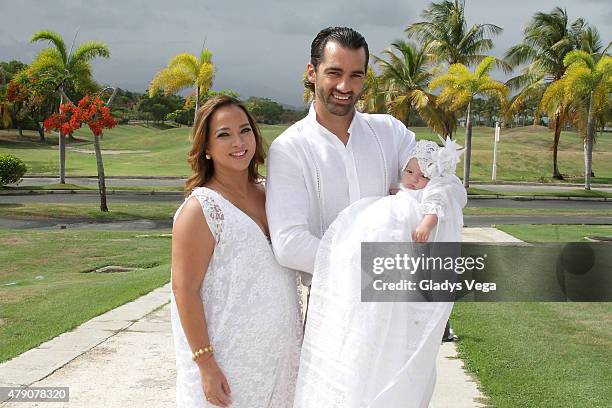 Adamari Lopez, Toni Costa poses with their baby Alaia, as part of her baptism at La Sagrada Familia Catholic Church on June 30, 2015 in Humacao,...