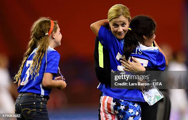 Head coach Jill Ellis of USA celebrates with her daughter after winning the FIFA Women's World Cup 2015 Semi Final match between USA and Germany at...