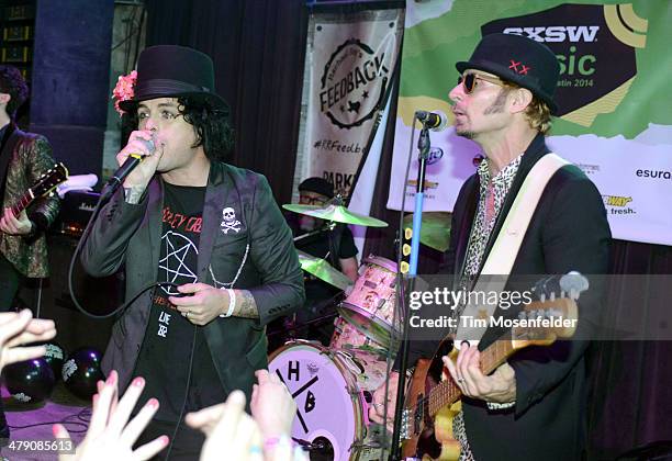 Billie Joe Armstrong and Mike Dirnt of Foxboro Hot Tubs perform as part of Rachel Ray's Feedback Party at Stubbs Bar-B-Que on March 15, 2014 in...