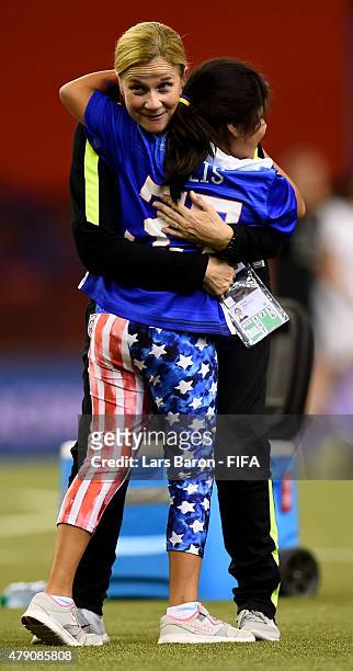 Head coach Jill Ellis of USA celebrates with her daughter after winning the FIFA Women's World Cup 2015 Semi Final match between USA and Germany at...