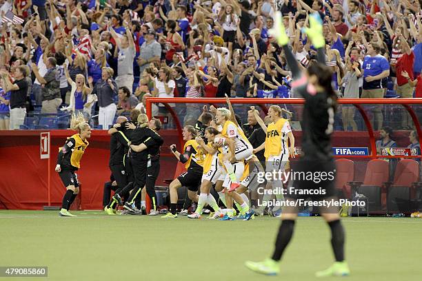 The United States bench celebrates after Kelley O'Hara of the United States scores in the second half against Germany in the FIFA Women's World Cup...