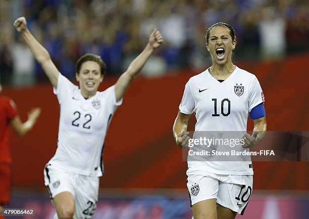 Carli Lloyd of USA celebrates scoring from the penalty spot during the FIFA Women's World Cup 2015 semi final match between USA and Germany at...