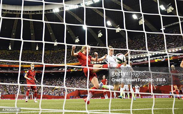 Kelley O Hara of USA scores the second goal during the FIFA Women's World Cup Semi Final match between USA and Germany at Olympic Stadium on June 30,...
