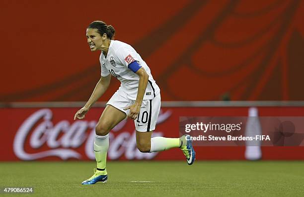 Carli Lloyd of USA celebrates scoring from the penalty spot during the FIFA Women's World Cup 2015 semi final match between USA and Germany at...