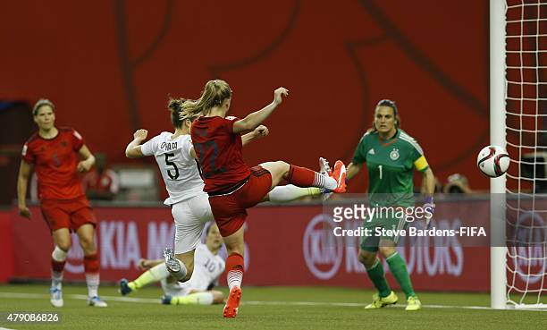 Kelley O'Hara of USA celebrates scores a goal during the FIFA Women's World Cup 2015 semi final match between USA and Germany at Olympic Stadium on...