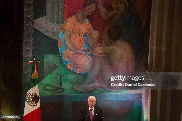 Director of Cervantes Institute, Victor Garcia gives a during a visit of Spanish Royals to the Universidad Nacional at UNAM's Simon Bolivar...