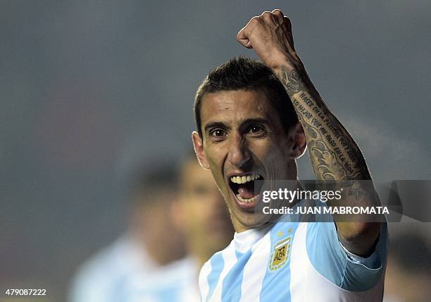 Argentina's forward Angel Di Maria celebrates after scoring against Paraguay during their Copa America semifinal football match in Concepcion, Chile...