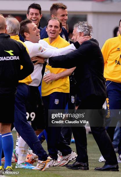 Antonio Cassano of Parma FC celebrates after scoring the first goal with his head coach Roberto Donadoni during the Serie A match between AC Milan...