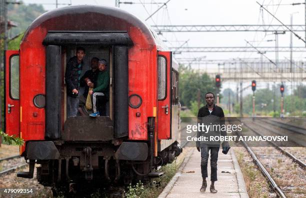 Migrant walk at a train station in the town of Gevgelija, on the Macedonian-Greek border, on June 30 on their way north to European countries. Peter...