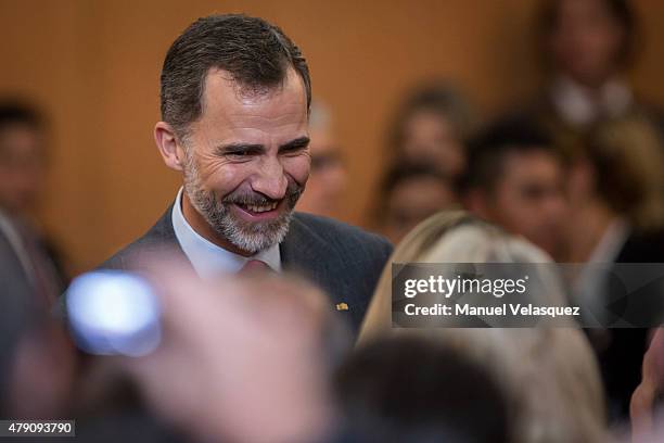 King Felipe VI talks to people during a meeting with members of the Spanish Community at Hospital Espanol on June 30, 2015 in Mexico City, Mexico....