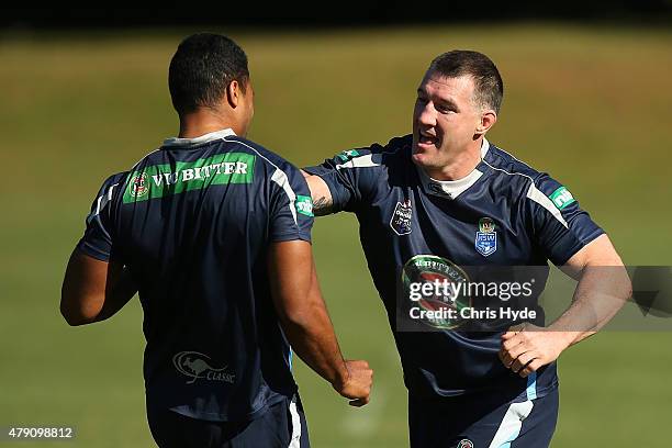 MIchael Jennings and Paul Gallen play tag during a New South Wales State of Origin at Novotel Coffs Harbour on July 1, 2015 in Coffs Harbour,...