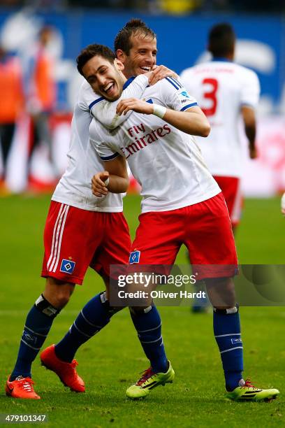 Hakan Calhanoglu of Hamburg celebrates after scoring their first goal during the Bundesliga match between Hamburger SV and 1. FC Nuernberg at Imtech...