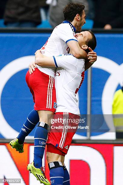 Petr Jiracek and Hakan Calhanoglu of Hamburg celebrates after scoring the second goal during the Bundesliga match between Hamburger SV and 1. FC...