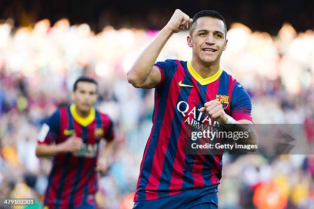 Alexis Sanchez of FC Barcelona celebrates after scoring his team's second goal during the La Liga match between FC Barcelona and CA Osasuna at Camp...