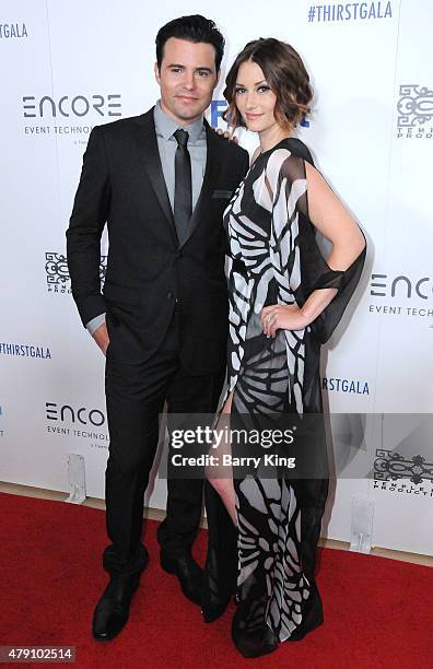 Actor Nathan West and actress Chyler Leigh arrive at the 6th Annual Thirst Gala at the Beverly Hilton Hotel on June 30, 2015 in Beverly Hills,...