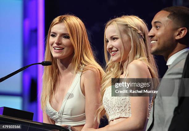 Actors Bella Thorne, Dove Cameron and Tahj Mowry speak onstage during the 6th Annual Thirst Gala at The Beverly Hilton Hotel on June 30, 2015 in...