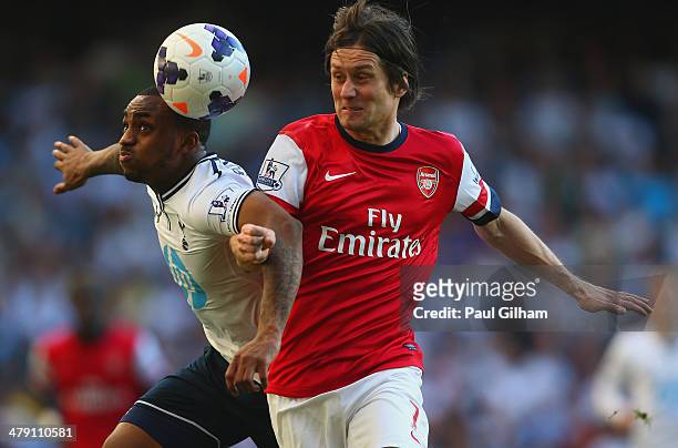 Danny Rose of Tottenham Hotspur and Tomas Rosicky of Arsenal battle for the ball during the Barclays Premier League match between Tottenham Hotspur...