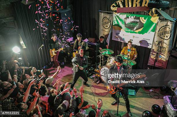 Foxboro Hot Tubs performs during Rachel Ray's Feedback Party at Stubbs on March 15, 2014 in Austin, Texas.