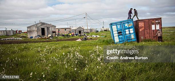 Yupik children play during summer vacation on June 30, 2015 in Newtok, Alaska. Newtok, which has a population of approximately of 375 ethnically...