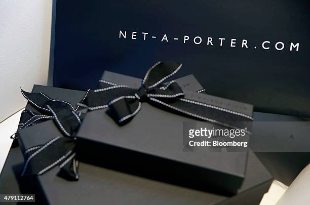 Net-A-Porter packaging sits at the company's head office in London, U.K., on Thursday, June 18, 2015. Net-a-Porter Chairman Natalie Massenet signaled...
