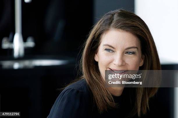 Natalie Massenet, founder and chairman of Net-A-Porter Ltd, poses for a photograph following an interview at the company's head office in London,...