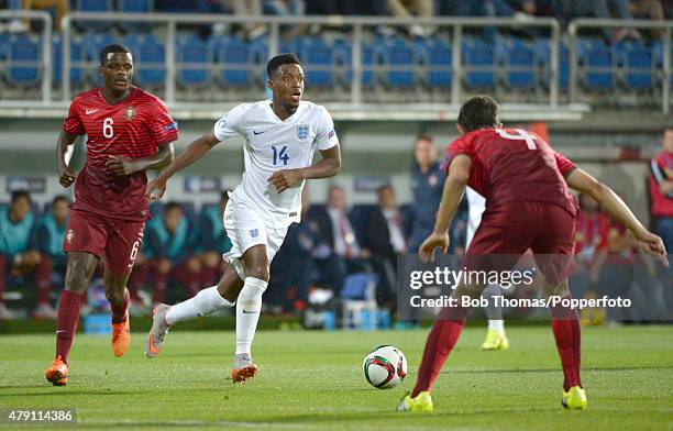 Nathaniel Chalobah of England with William Carvalho and Paulo Oliveira of Portugal during the UEFA Under21 European Championship 2015 Group B match...