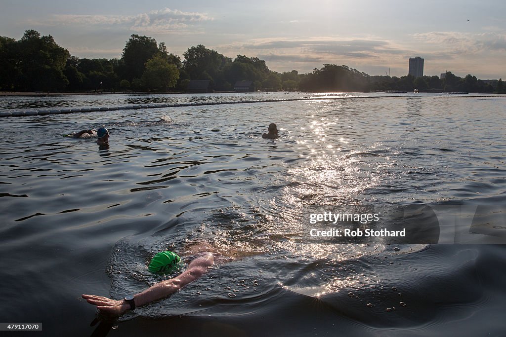 Londoners Take An Early Morning Dip In The Serpentine On The Hottest Day This Year