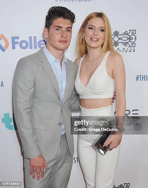 Actors Bella Thorne and Gregg Sulkin arrive at the 6th Annual Thirst Gala at The Beverly Hilton Hotel on June 30, 2015 in Beverly Hills, California.