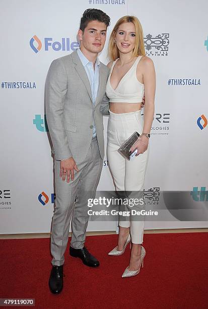 Actors Bella Thorne and Gregg Sulkin arrive at the 6th Annual Thirst Gala at The Beverly Hilton Hotel on June 30, 2015 in Beverly Hills, California.