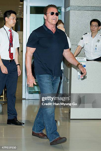 Actor Arnold Schwarzenegger, sun glasses detail, is seen upon arrival at Incheon International Airport on July 1, 2015 in Incheon, South Korea.