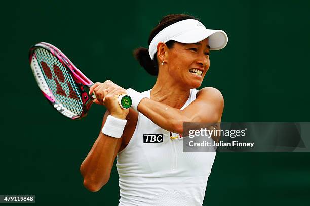 Kimiko Date-Krumm of Japan returns a shot in her Ladies Doubles First Round match with Francesca Schiavone of Italy against Klaudia Jan-Ignacik of...