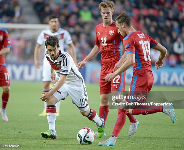 Matej Hybs of the Czech Republic with Amin Younes of Germany during the UEFA European Under-21 Group A match between Germany and Czech Republic at...