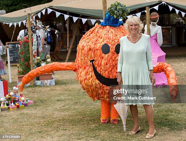 Camilla, Duchess of Cornwall visits the Hampton Court Palace Flower Show at Hampton Court Palace on July 1, 2015 in London, England.