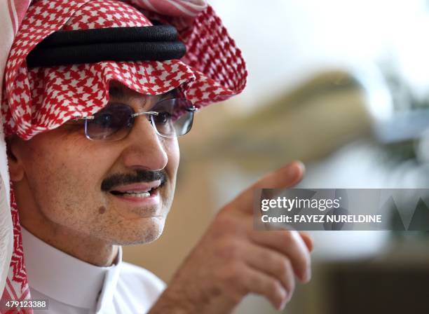 Saudi Arabia's billionaire Prince Alwaleed bin Talal speaks to reporters during a press conference in the Saudi capital, Riyadh, on July 1, 2015....