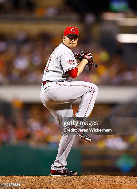 Manny Parra of the Cincinnati Reds pitches against the Pittsburgh Pirates during the game at PNC Park on June 24, 2015 in Pittsburgh, Pennsylvania.