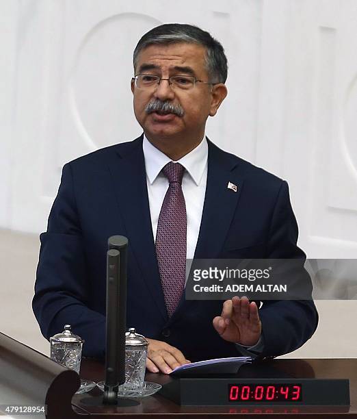 Justice and Development Party MP Ismet Yilmaz delivers a speech after his election as Parliament speaker at the Turkish Grand National Assembly in...