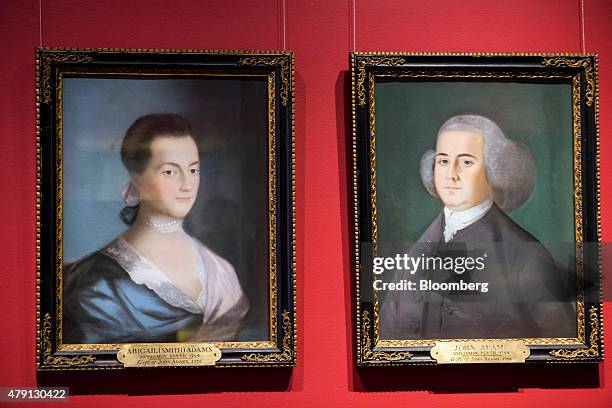 Paintings of former U.S. President John Adams, right, and his wife Abigail Adams are displayed at the Massachusetts Historical Society in Boston,...