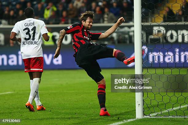 Frustrated Marco Russ of Frankfurt hits the goal post during the Bundesliga match between Eintracht Frankfurt and SC Freiburg at Commerzbank Arena on...