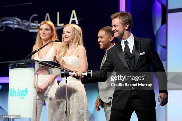 A Actors Bella Thorne, Dove Cameron, Tahj Mowry and Michael Welch speak onstage during the 6th Annual Thirst Gala at The Beverly Hilton Hotel on June...