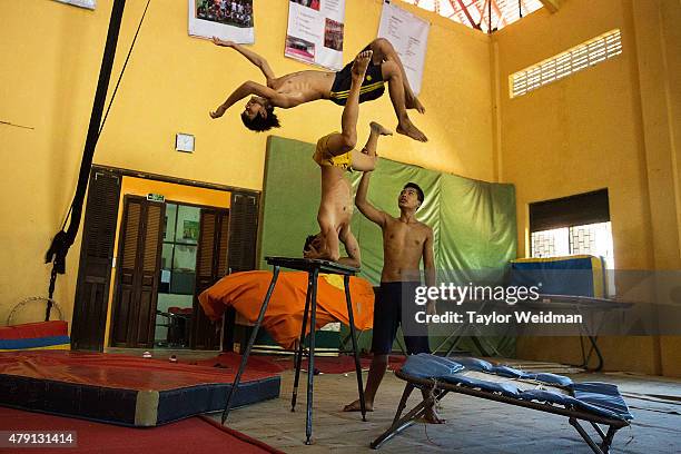 Circus students practice before an upcoming performance on July 1, 2015 at Phare Ponleu Salpak in Battambang, Cambodia. Phare Ponleu Salpak is an...