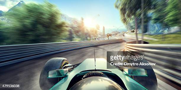 formula one racing car on the track - car racing stock pictures, royalty-free photos & images