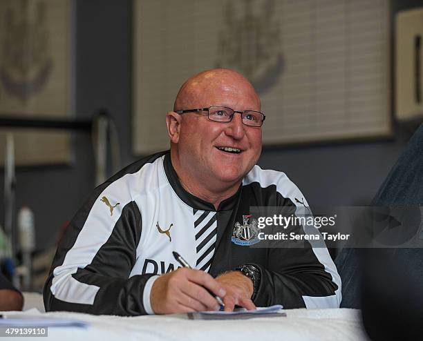 Senior physiotherapist Derek Wright takes notes during the Newcastle United Pre-Season Training session at The Newcastle United Training Centre on...