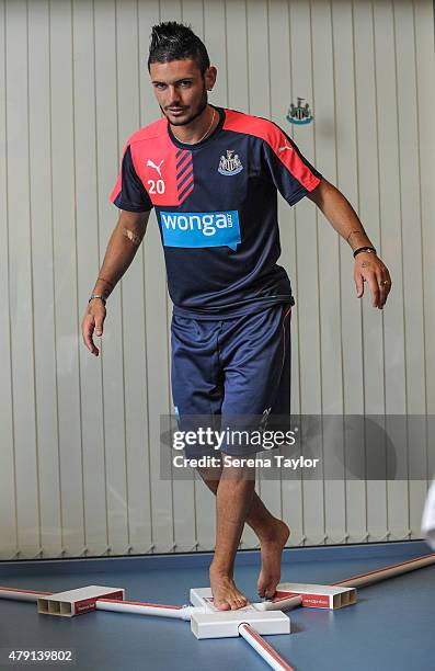 Remy Cabella does a stretch test during the Newcastle United Pre-Season Training session at The Newcastle United Training Centre on July 1 in...