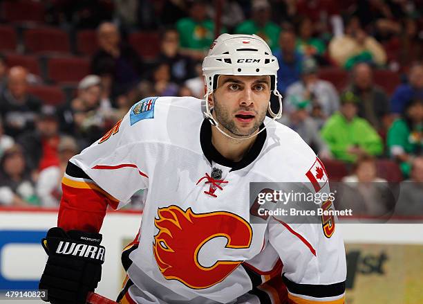 Mark Giordano of the Calgary Flames skates against the Phoenix Coyotes at the Jobing.com Arena on March 15, 2014 in Glendale, Arizona. The Coyotes...