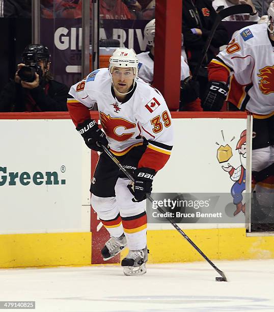 Galiardi of the Calgary Flames skates against the Phoenix Coyotes at the Jobing.com Arena on March 15, 2014 in Glendale, Arizona. The Coyotes...