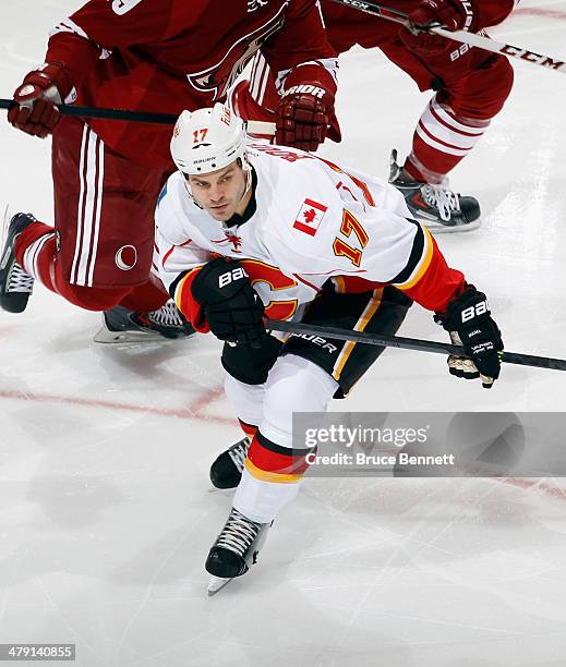 Lance Bouma of the Calgary Flames skates against the Phoenix Coyotes at the Jobing.com Arena on March 15, 2014 in Glendale, Arizona. The Coyotes...