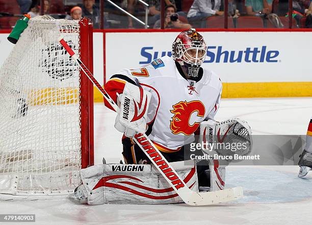 Joni Ortio of the Calgary Flames tends net against the Phoenix Coyotes at the Jobing.com Arena on March 15, 2014 in Glendale, Arizona. The Coyotes...